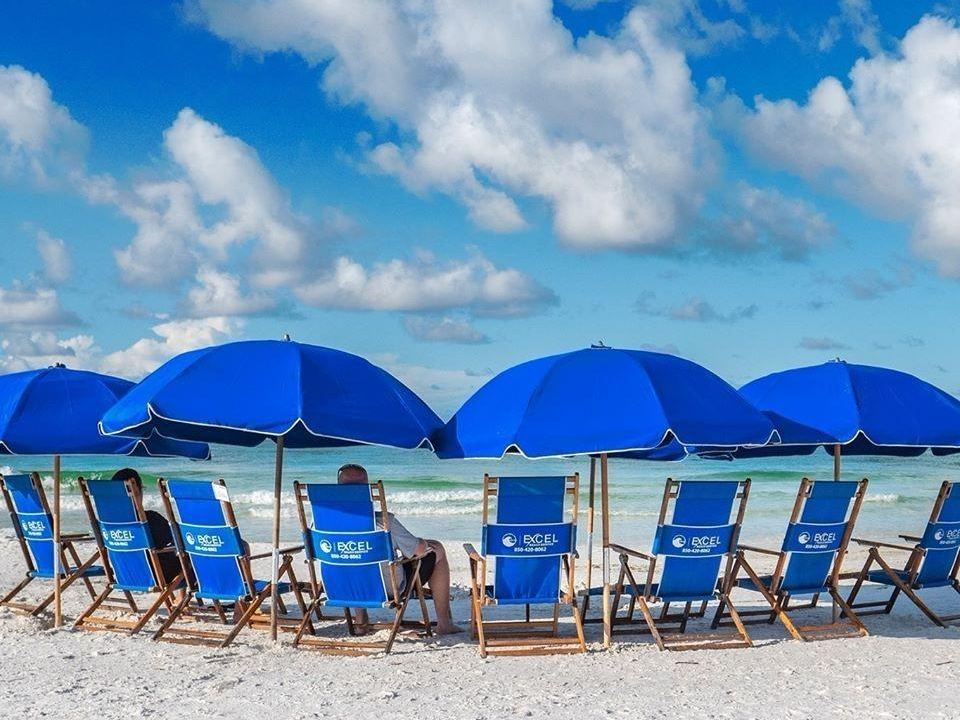 private beach chairs and umbrellas