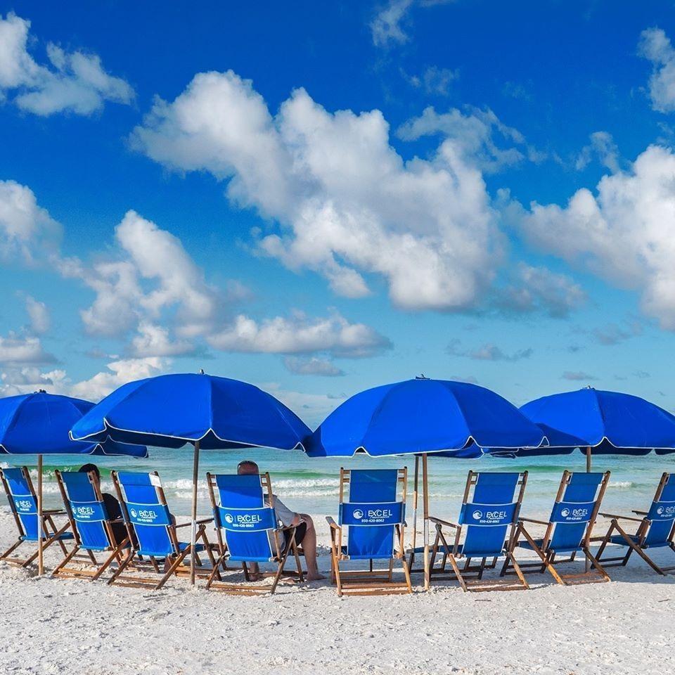 private beach chairs and umbrellas