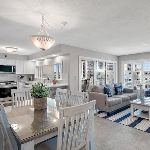 Bright two-bedroom condo rental at Silver Dunes in Destin, Florida featuring a spacious living area and modern kitchen.