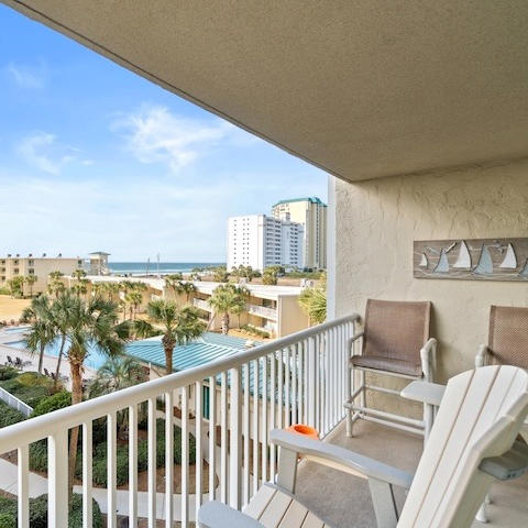 Private balcony at Silver Dunes in Destin, Florida overlooking the pool, beach, and Gulf of Mexico.